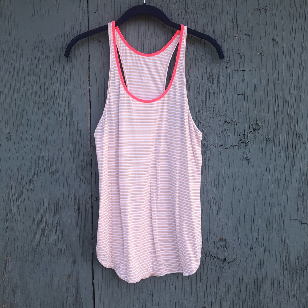 White and orange striped Lululemon workout tank